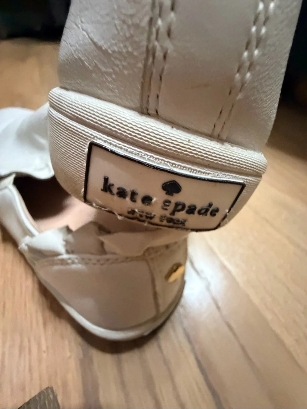 kate Spade “Lilly” Women’s White Leather Sneakers w/ Gold Spade Accent